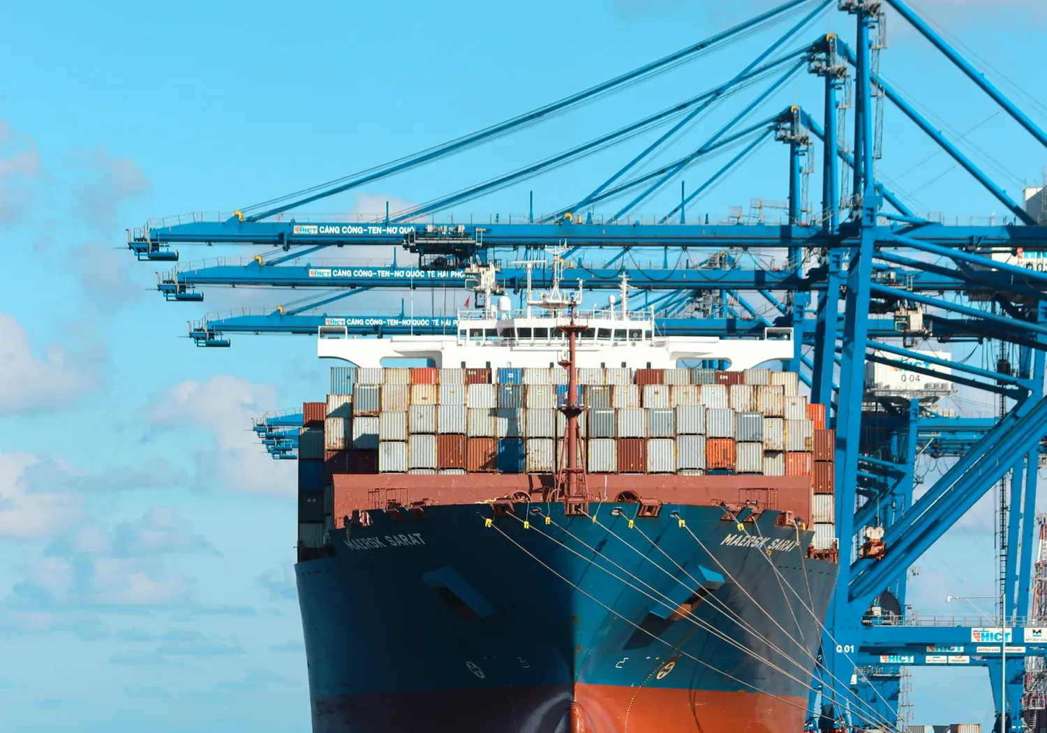 Container ship and terminal at a port
